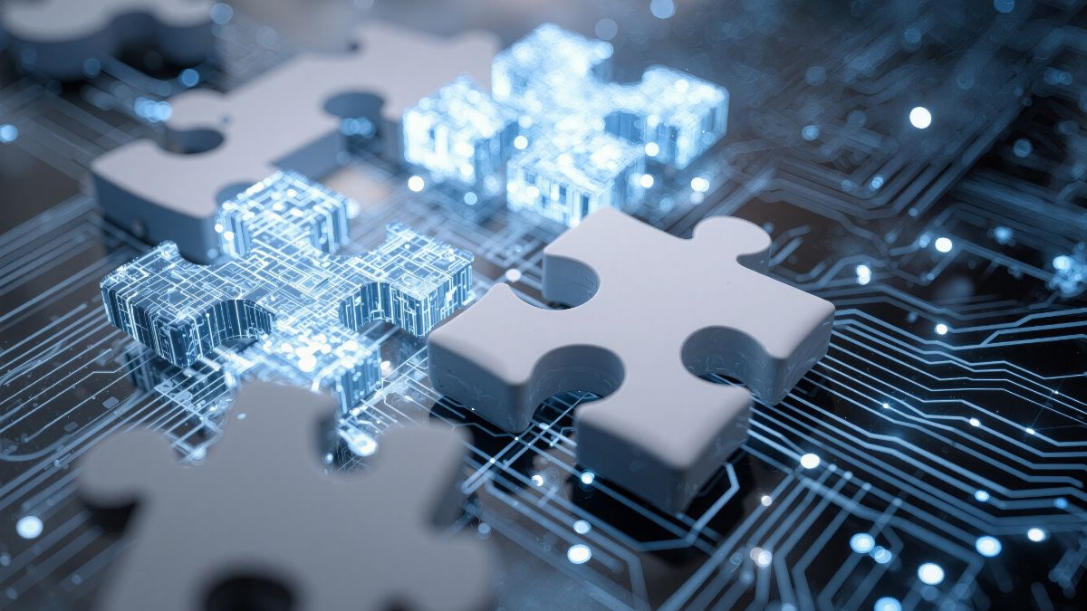 Svetelný obraz elektronických súčiastok v tvare puzzle na doske s obvodmi.