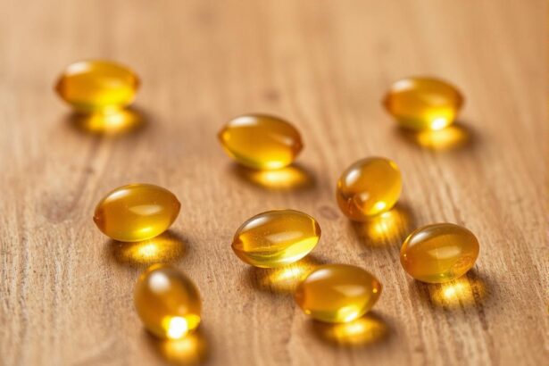 Olejové kapsuly vitamínu D na drevenom pozadí